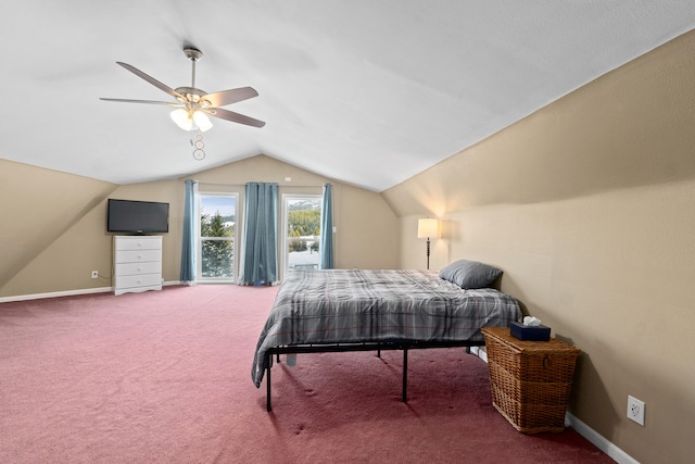 bedroom with lofted ceiling, dark carpet, and ceiling fan