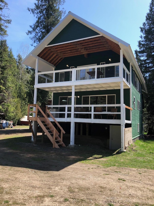 rear view of house with a balcony