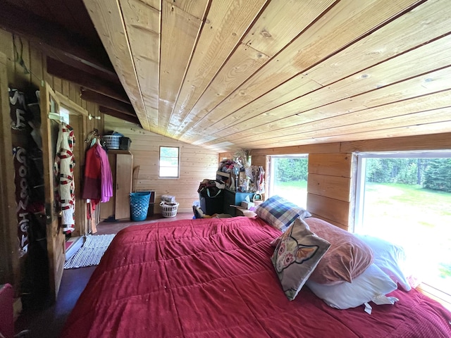bedroom featuring wooden walls, wood ceiling, and lofted ceiling