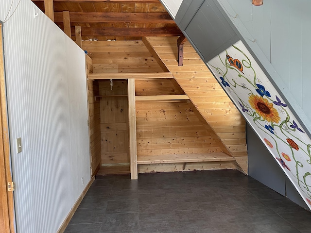 additional living space with wooden walls