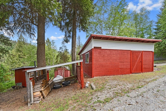 view of outbuilding with an outbuilding