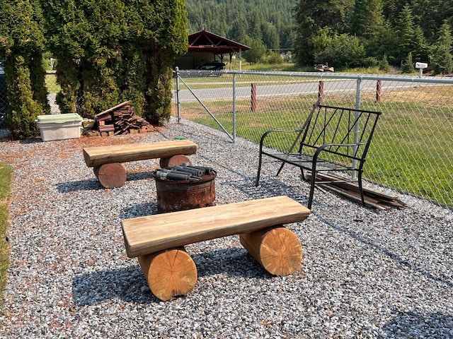 2851 Deep Lake Lopps Rd, Colville, WA 99114 - view of community with a yard, a forest view, and fence