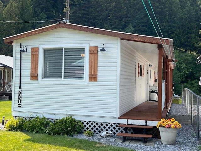 2851 Deep Lake Lopps Rd, Colville, WA 99114 - view of property exterior with a forest view and fence