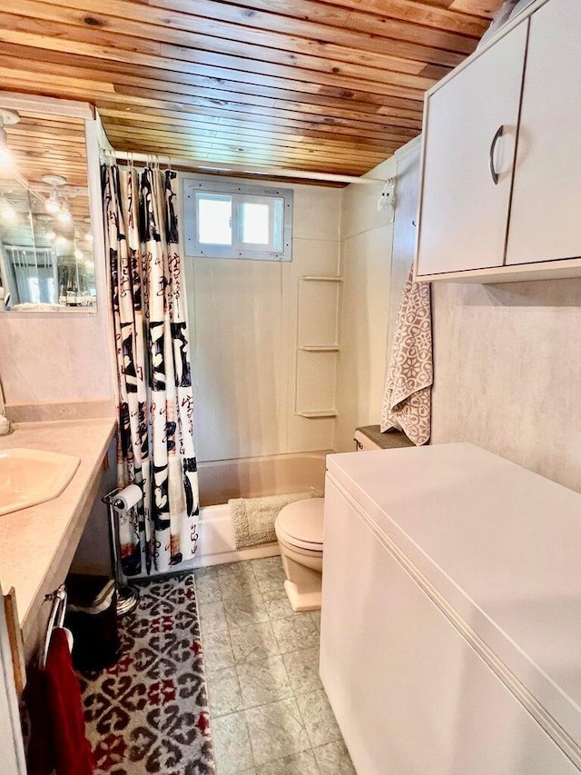2851 Deep Lake Lopps Rd, Colville, WA 99114 - full bathroom featuring toilet, vanity, wooden ceiling, and shower / tub combo with curtain