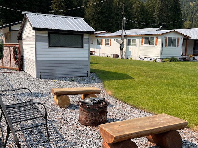 2851 Deep Lake Lopps Rd, Colville, WA 99114 - view of yard featuring an outbuilding and a storage shed