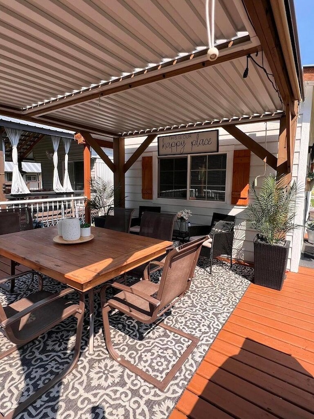 2851 Deep Lake Lopps Rd, Colville, WA 99114 - wooden deck with a patio area and outdoor dining area