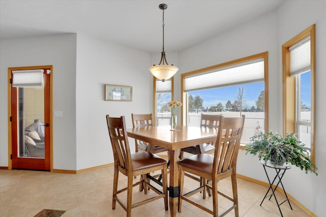 dining space with baseboards
