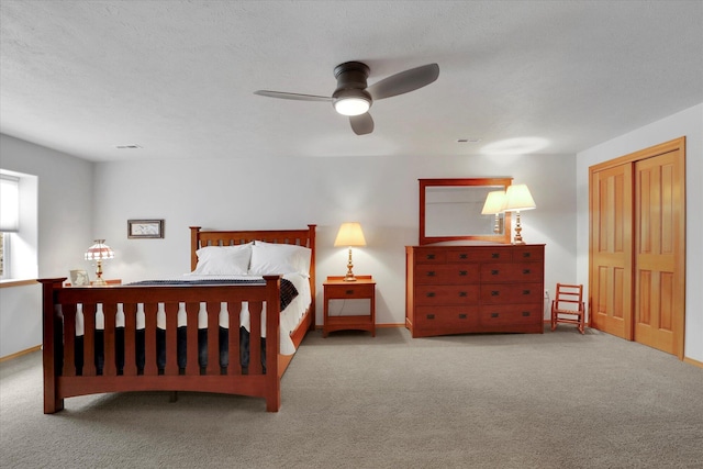 bedroom with baseboards, carpet flooring, and visible vents