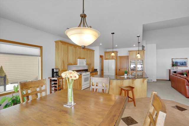 dining area featuring recessed lighting, light colored carpet, and visible vents