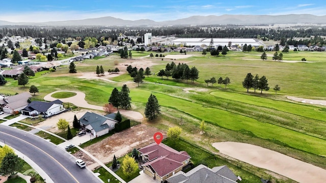 bird's eye view with a residential view and a mountain view