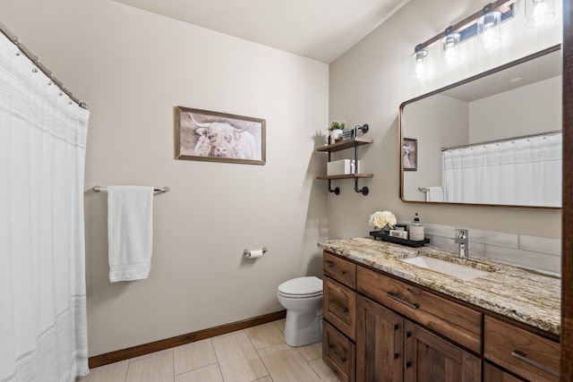31914 N Zander Ln, Chattaroy, WA 99003 - full bath with vanity, toilet, baseboards, and a shower with curtain