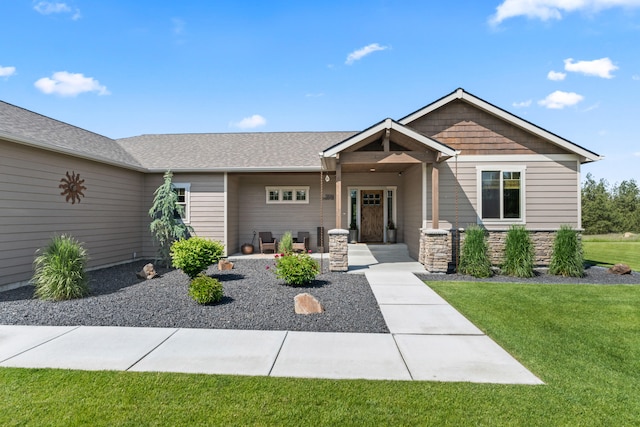 31914 N Zander Ln, Chattaroy, WA 99003 - craftsman-style home with a front yard and stone siding