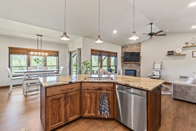 31914 N Zander Ln, Chattaroy, WA 99003 - kitchen with dishwasher, open floor plan, a sink, healthy amount of natural light, and lofted ceiling