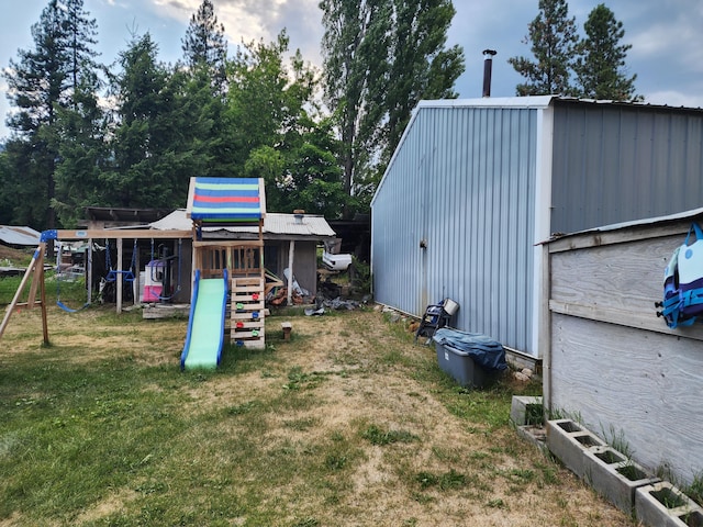 view of yard with a playground