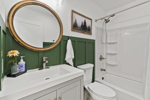 2419 Indian Ridge Rd, Chewelah, WA 99109 - bathroom with toilet,  shower combination, vanity, and a decorative wall