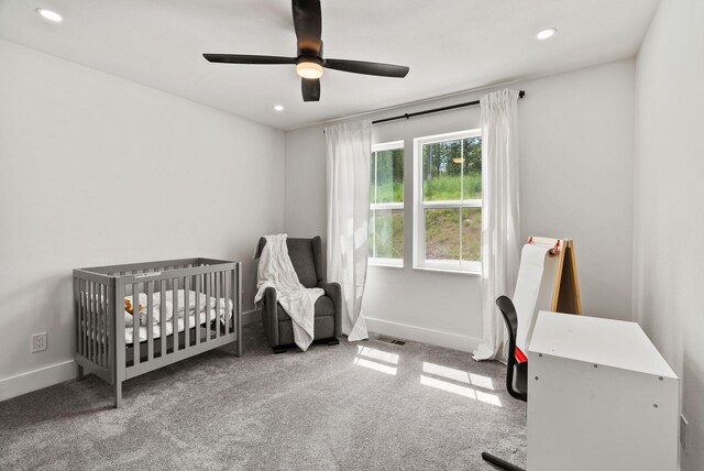 2419 Indian Ridge Rd, Chewelah, WA 99109 - bedroom with recessed lighting, carpet flooring, a crib, baseboards, and a ceiling fan