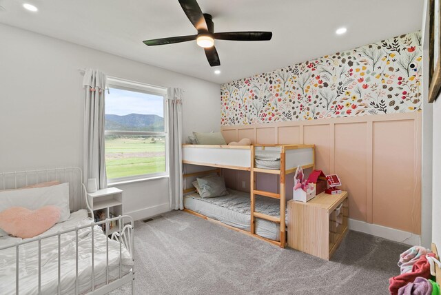 2419 Indian Ridge Rd, Chewelah, WA 99109 - carpeted bedroom with recessed lighting, ceiling fan, a mountain view, and baseboards