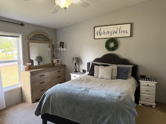 bedroom featuring carpet floors and a ceiling fan