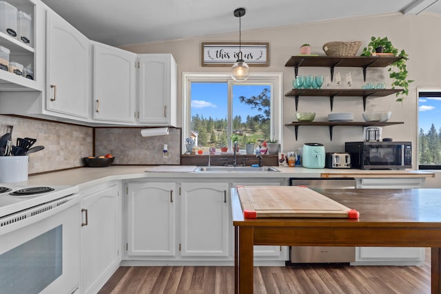 kitchen featuring white cabinetry, open shelves, a sink, white electric stove, and wood finished floors