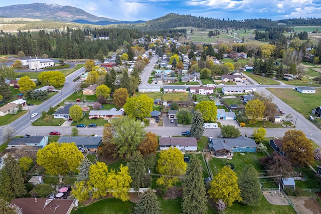 aerial view featuring a mountain view and a residential view