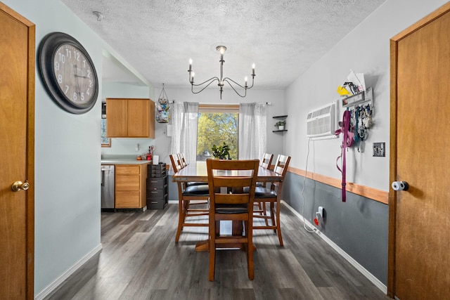 dining room with dark wood-style floors, a notable chandelier, and a textured ceiling