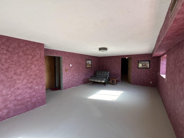 interior space featuring a textured ceiling