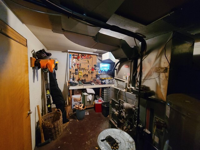 basement with a workshop area