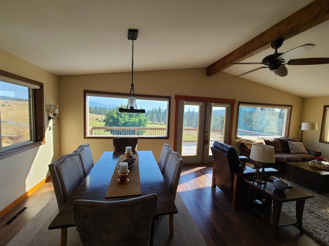 dining space featuring hardwood / wood-style flooring, lofted ceiling with beams, and french doors