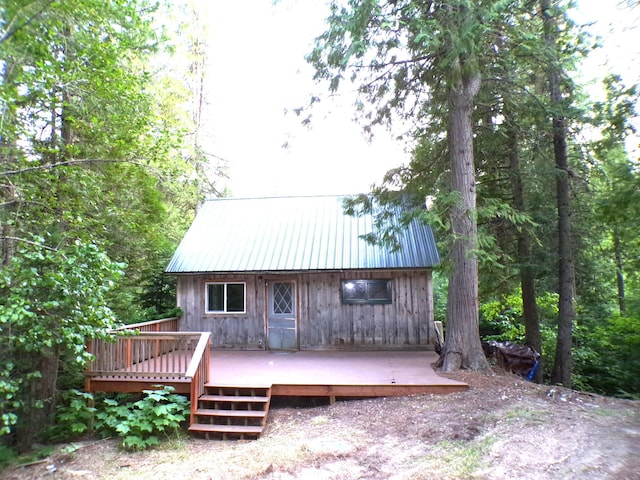 rear view of house with a deck