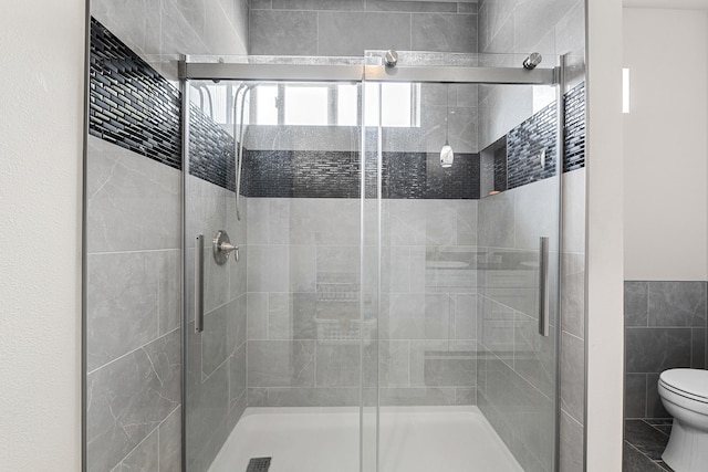 250 Hogans Way, Chewelah, WA 99109 - full bathroom with tile walls and a shower stall