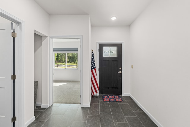 250 Hogans Way, Chewelah, WA 99109 - entrance foyer with baseboards and dark marble finish floors