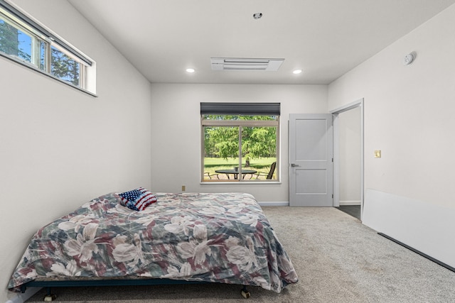 250 Hogans Way, Chewelah, WA 99109 - bedroom featuring carpet floors, multiple windows, and recessed lighting