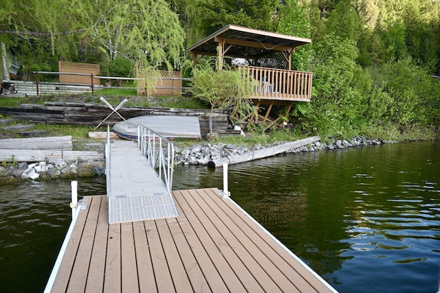 2952 Deep Lake Boundary Rd, Colville, WA 99114 - dock featuring a wooded view, fence, and a water view