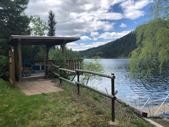 2952 Deep Lake Boundary Rd, Colville, WA 99114 - dock featuring a forest view and a water view