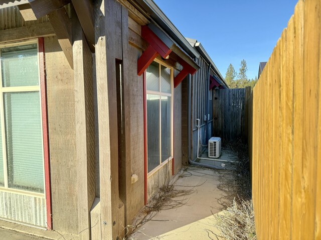 view of side of property with a patio area