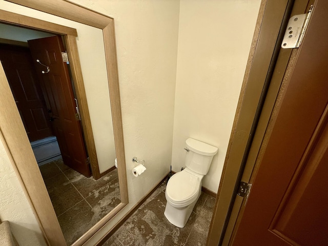 bathroom featuring toilet