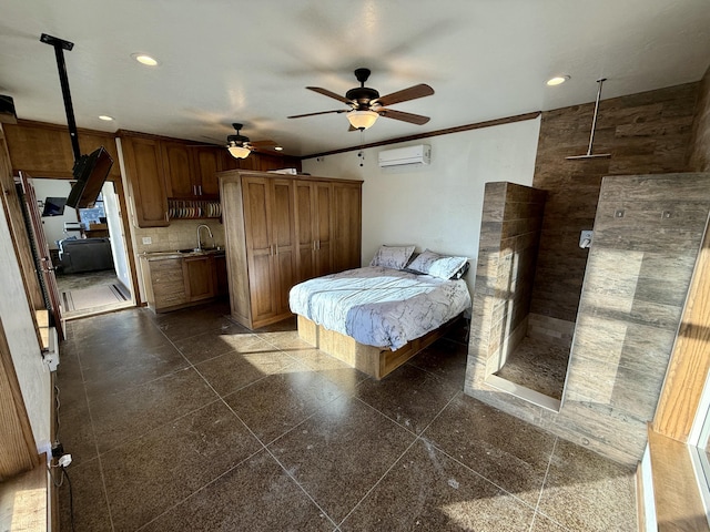 bedroom featuring sink, an AC wall unit, and ceiling fan