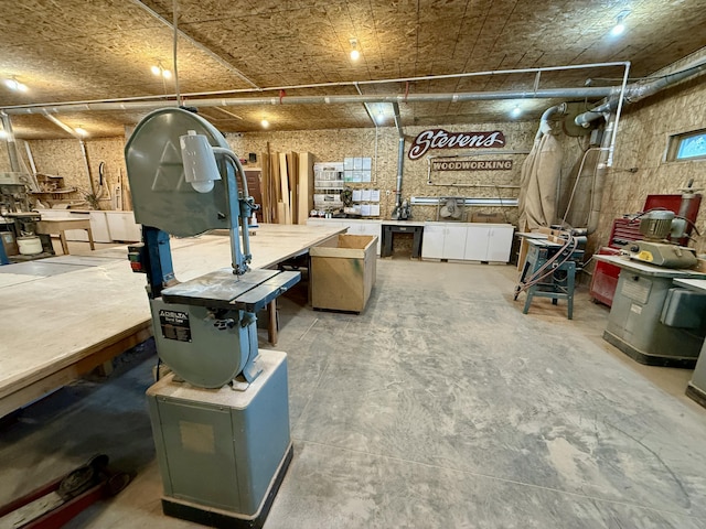 basement with a workshop area