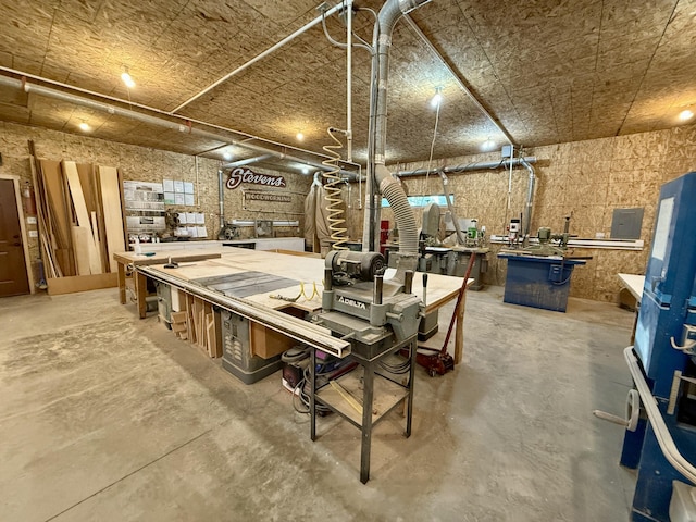 basement with a workshop area