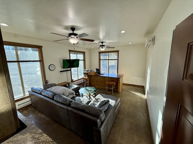 living room with a wall mounted air conditioner, a wealth of natural light, and a baseboard radiator