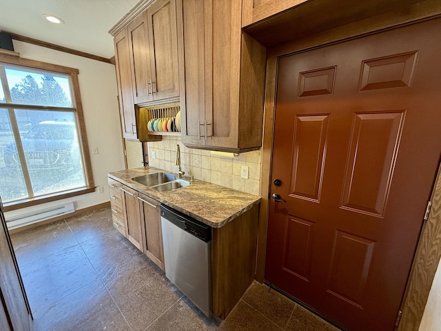 kitchen featuring sink, light stone counters, baseboard heating, stainless steel dishwasher, and decorative backsplash