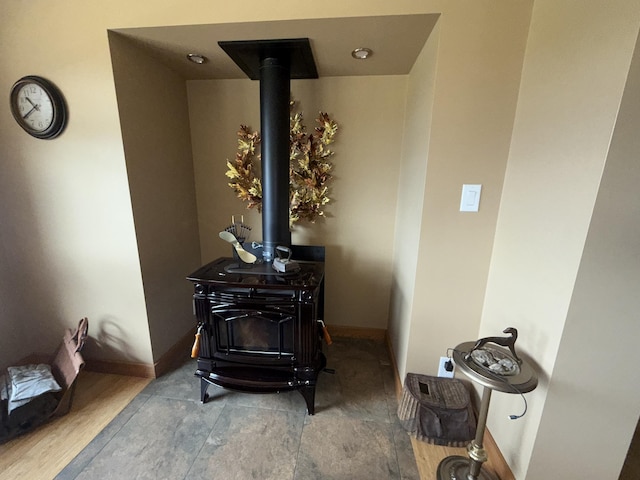 108 Grizzly Loop, Republic, WA 99166 - detailed view of a wood stove and baseboards