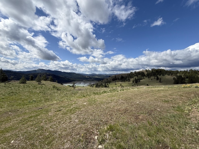 108 Grizzly Loop, Republic, WA 99166 - view of mountain backdrop with a nearby body of water