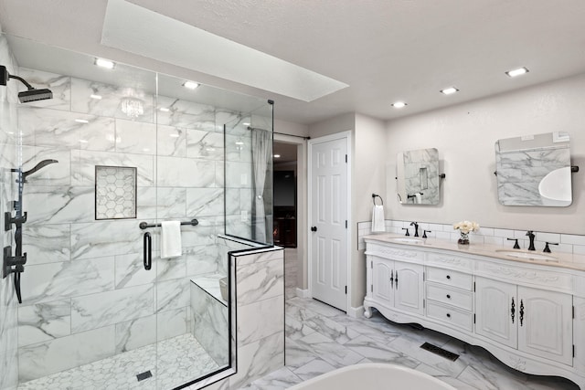4203 S Suncrest Ln, Spokane Valley, WA 99037 - bathroom with double vanity, marble look tile flooring, a stall shower, recessed lighting, and a bathtub