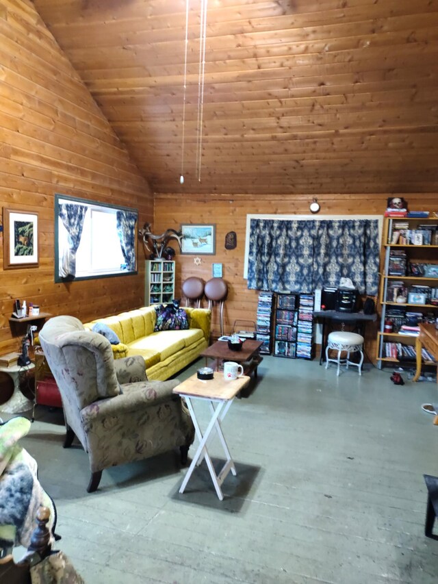 living room featuring wood walls, high vaulted ceiling, and wooden ceiling