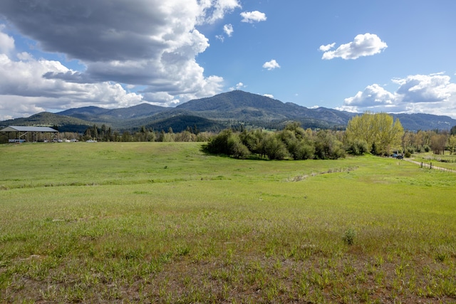 view of mountain feature featuring a rural view