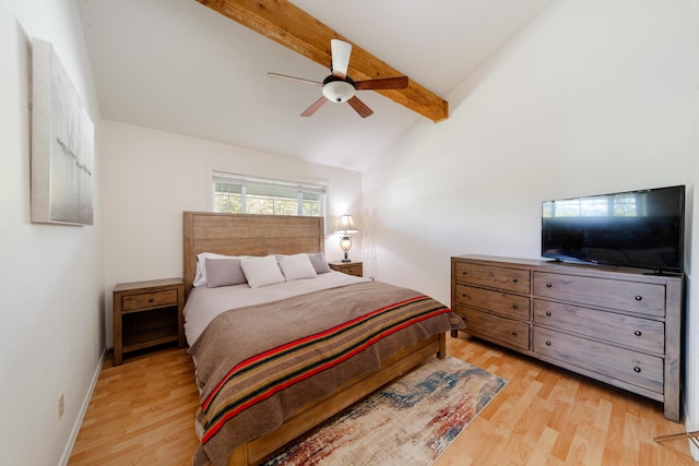 bedroom featuring light wood-style floors, vaulted ceiling with beams, baseboards, and ceiling fan