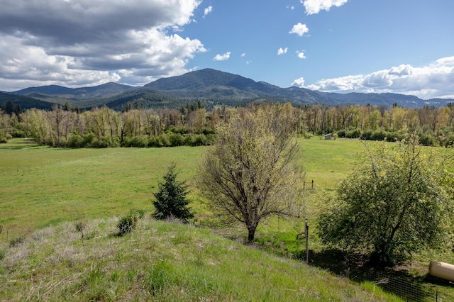 view of mountain feature with a rural view