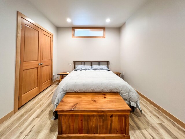 bedroom featuring light hardwood / wood-style flooring