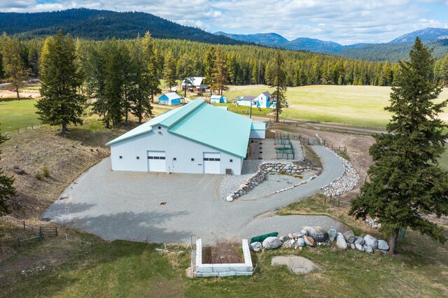 drone / aerial view featuring a mountain view